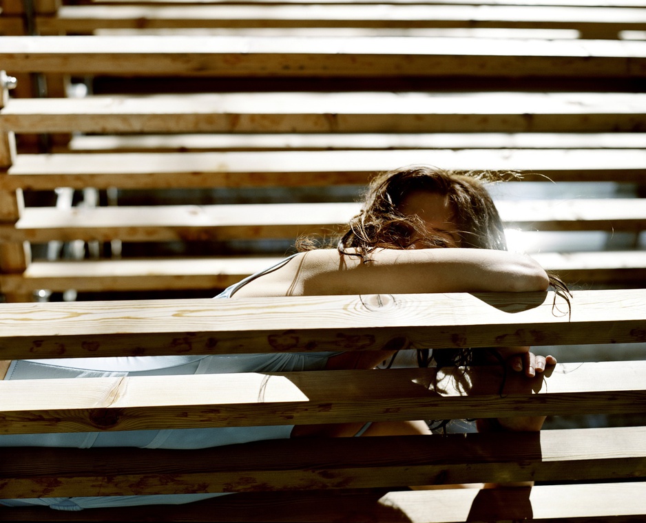 Girl enjoying the sun at Vigilius Hotel terrace