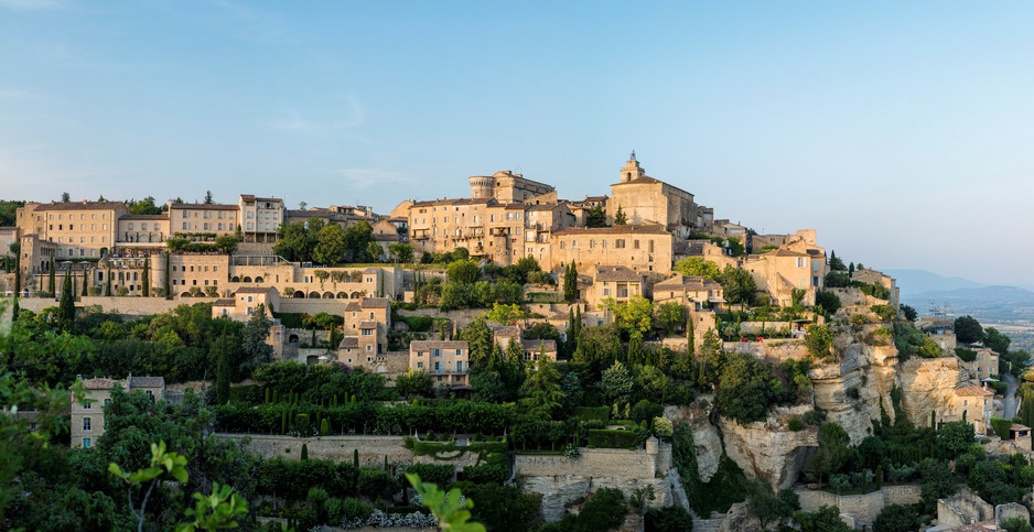 Gordes Village With Stone Walls And Terracotta Roof Tiles