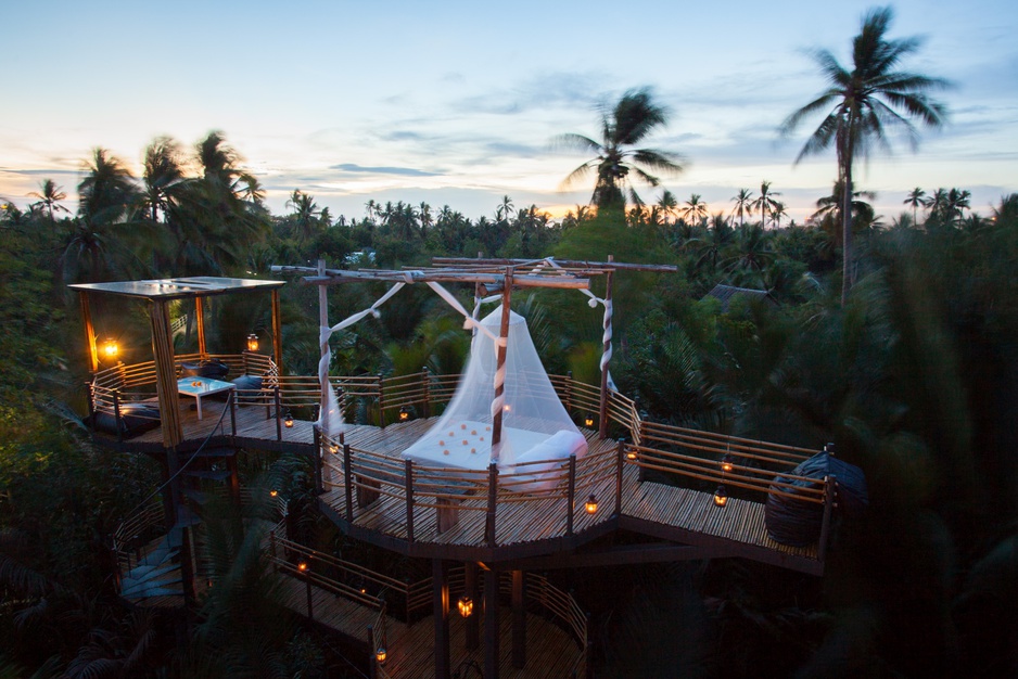 Bangkok Tree House rooftop open air bedroom at night