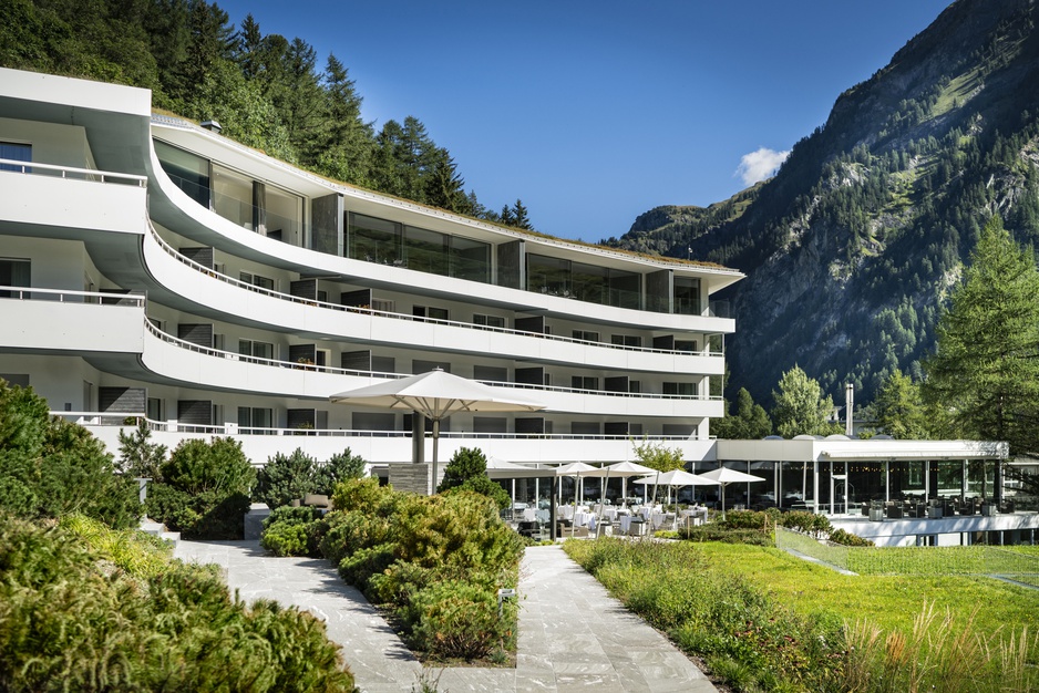 7132 Hotel Building With Alps In The Background