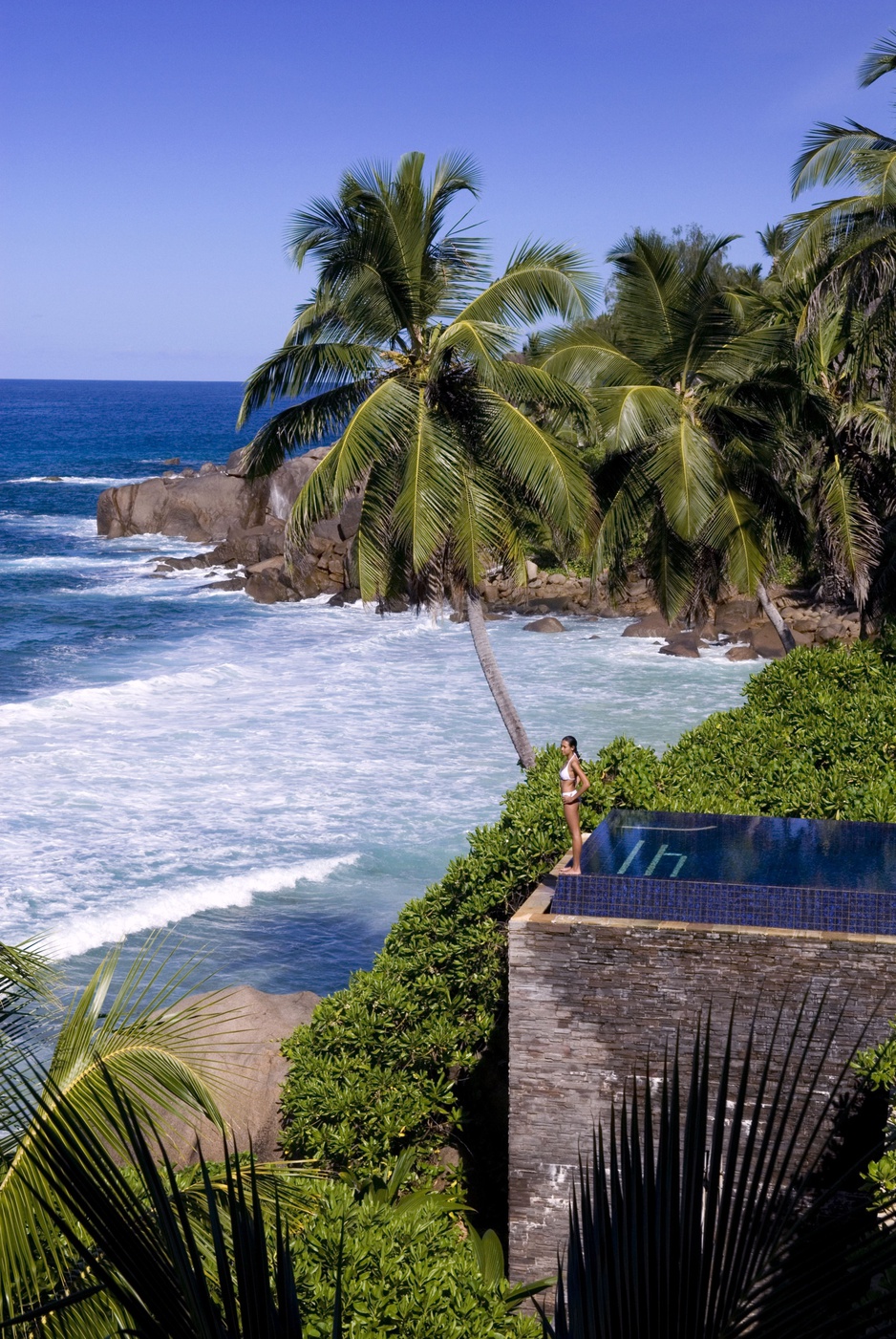 Infinity edge pool with a girl