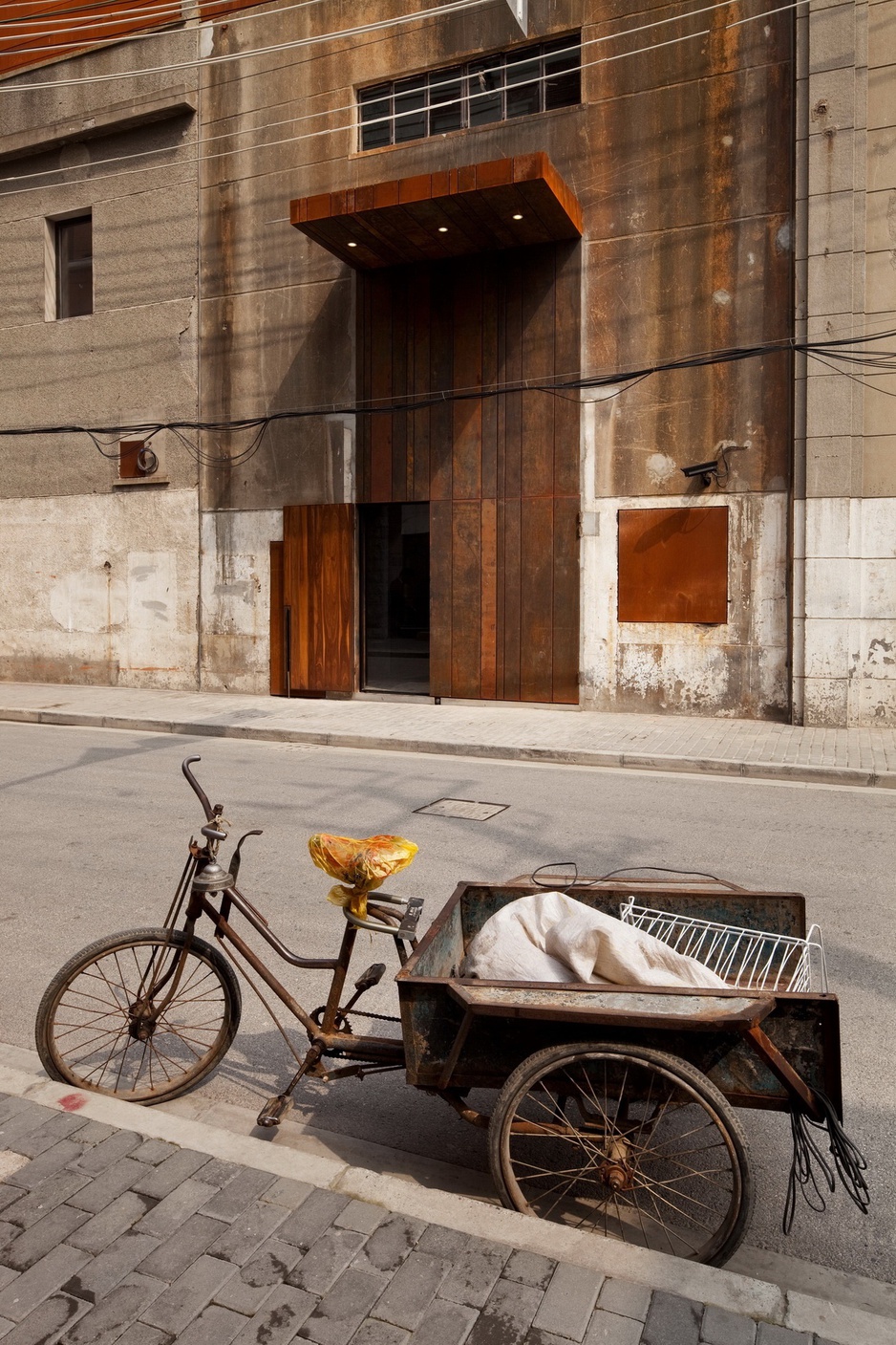 The Waterhouse at South Bund main entrance with an old bike