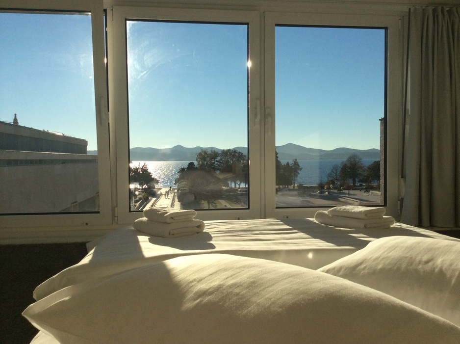 Boutique Hostel Forum lux white room panorama from bed on Zadar