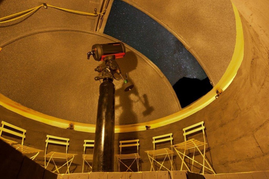 Gazing at the stars with the telescope from inside the tent of Elqui Domos