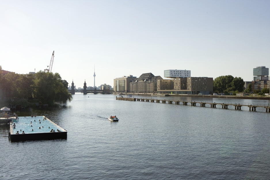 View on the nhow Berlin with the swimming pool of the Badeschiff