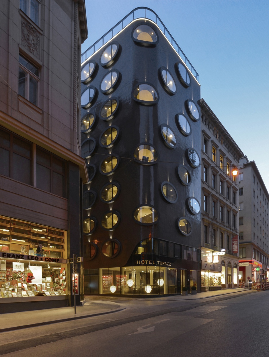 Hotel Topazz Vienna building exterior at night