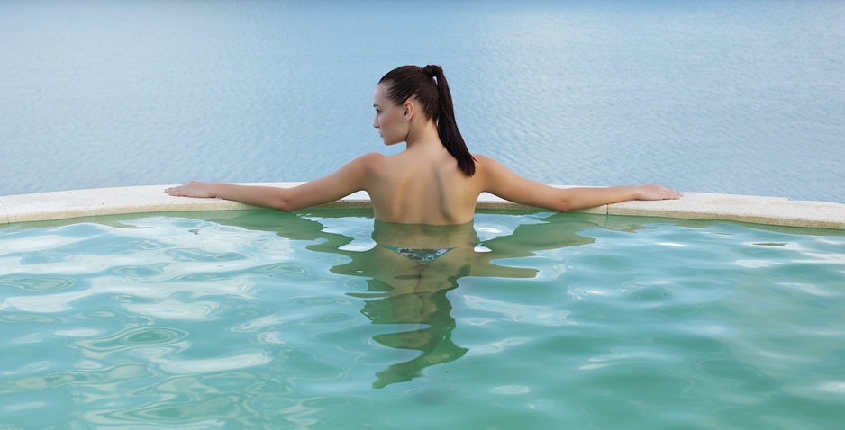 Domes of Elounda topless girl in the pool