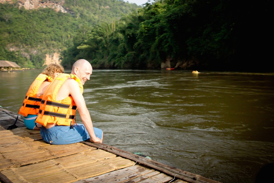 Sitting on the wooden platform at the River Kwai