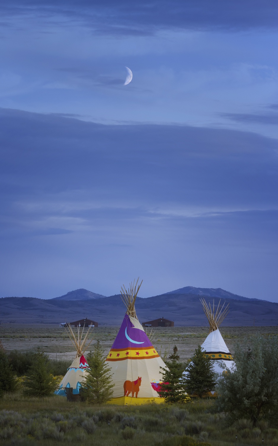 Mustang Monument Resort tipis at night