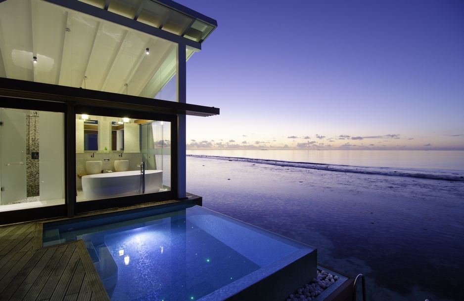 Kandolhu Island water villa pool at night