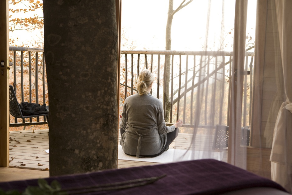 Yoga on the terrace of the tree house