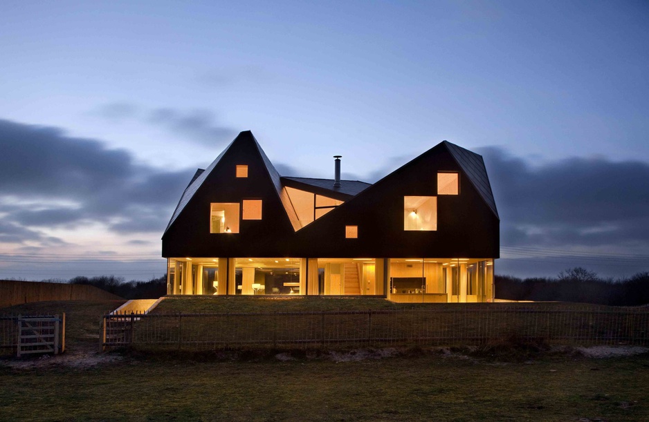 The Dune House at night