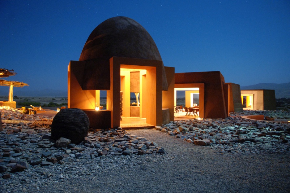 Okahirongo Elephant Lodge entrance buildings at night