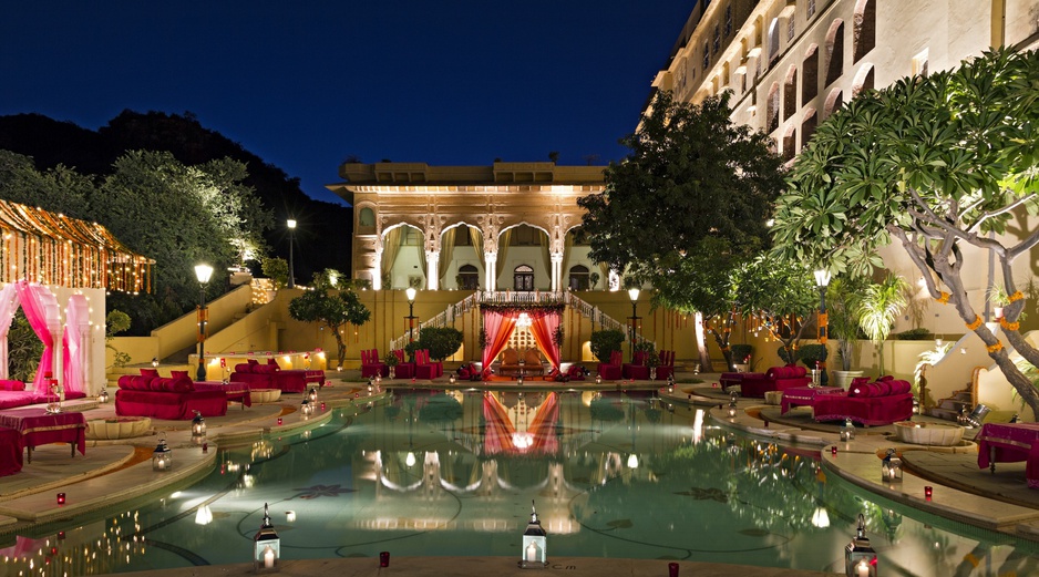 Samode Palace swimming pool at night with decorative lights