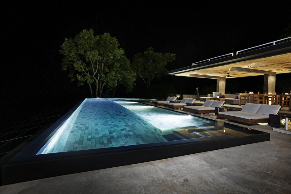 Kura Design Villas pool at night