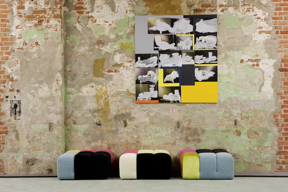 Andels Hotel Lodz brick wall and colorful ottomans