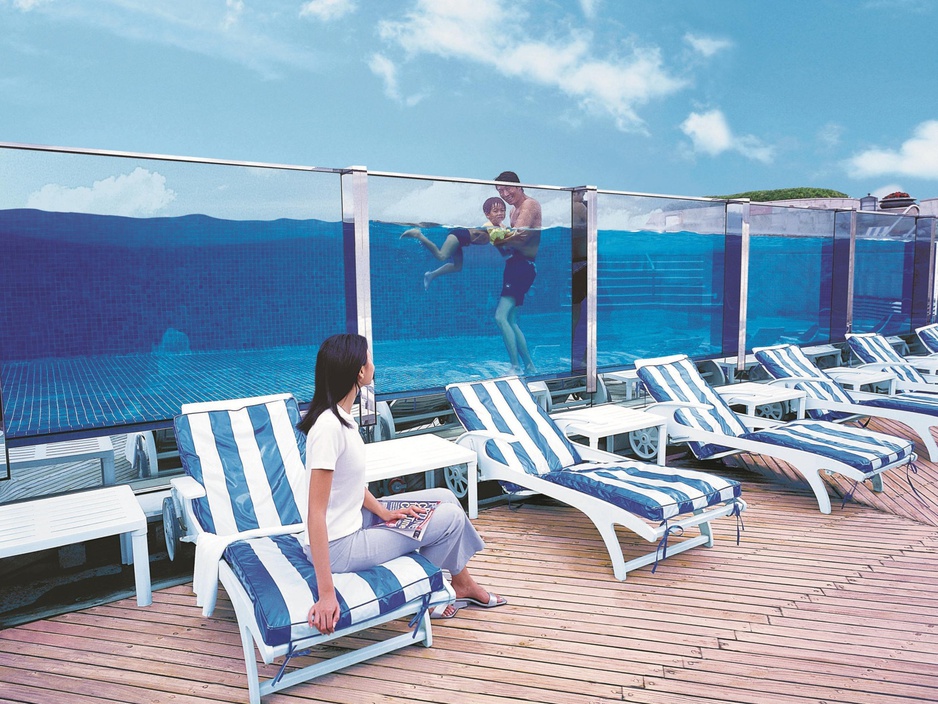 Glass wall see through swimming pool on top of Harbour Grand Kowloon