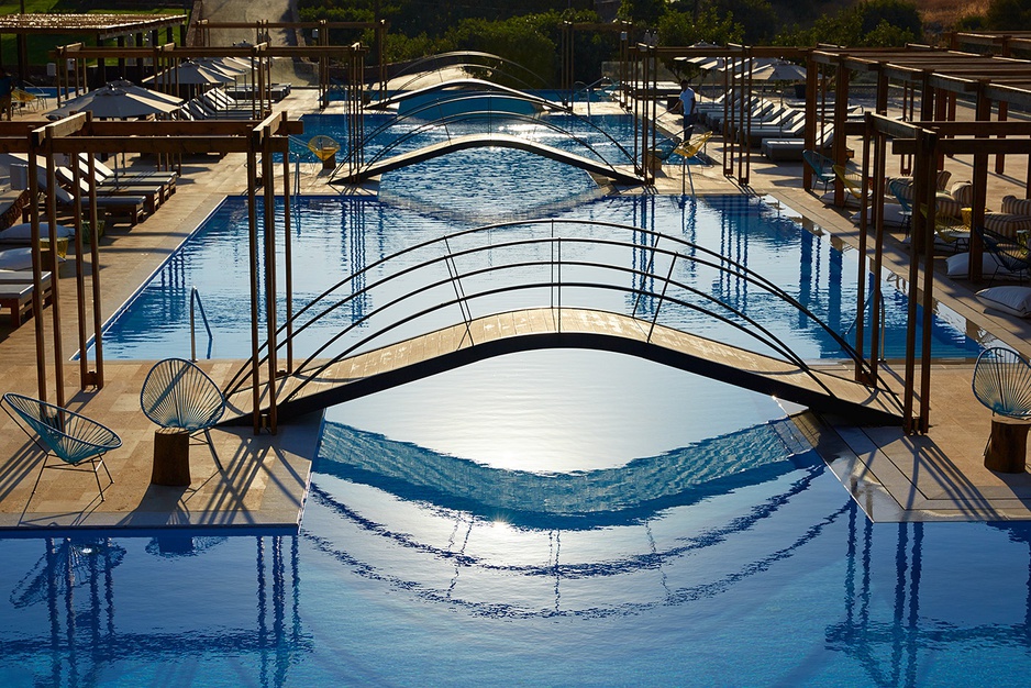 Domes of Elounda outdoor pools with bridges above them