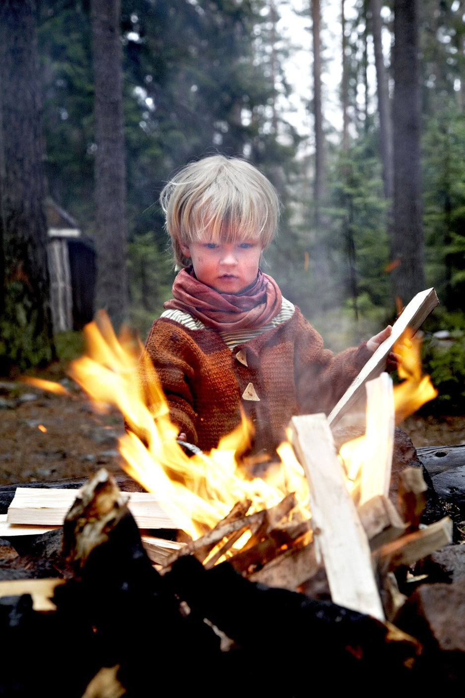 Boy at the fireplace