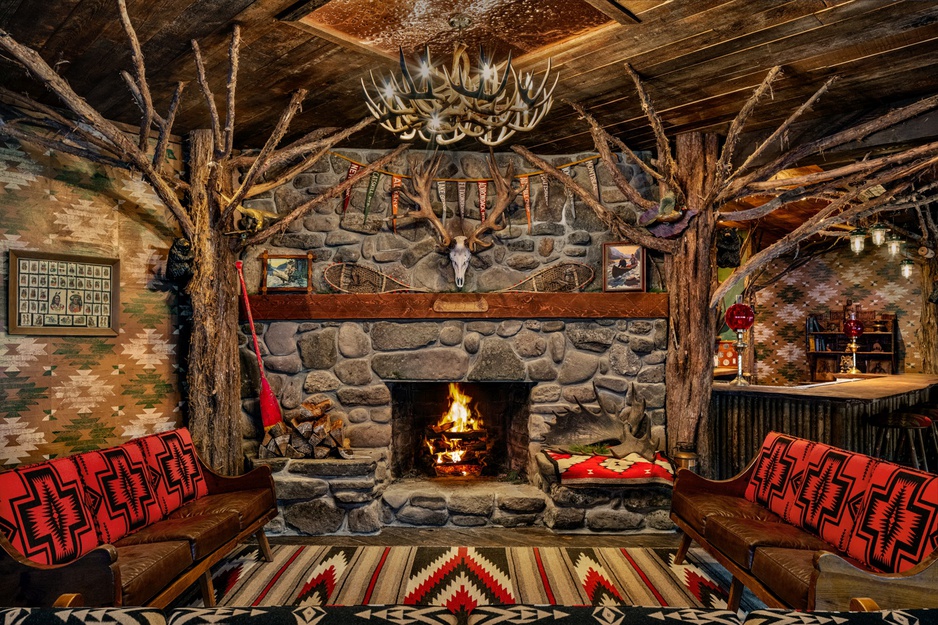 Urban Cowboy Lodge Lounge With Fireplace And Antlers