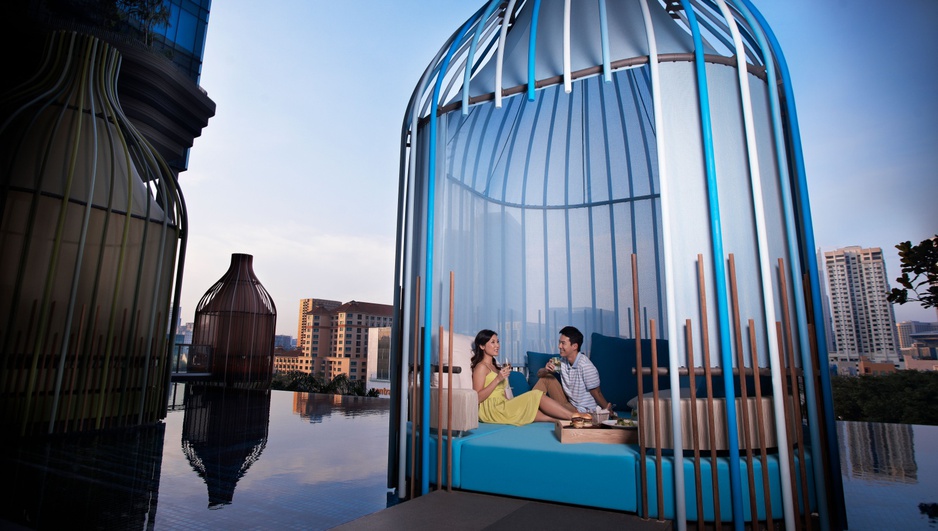 Couple chilling by the pool