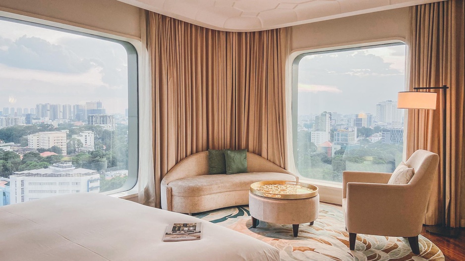 Hotel Des Arts Saigon Corner Room Sofa & City Panorama From Two Large Windows