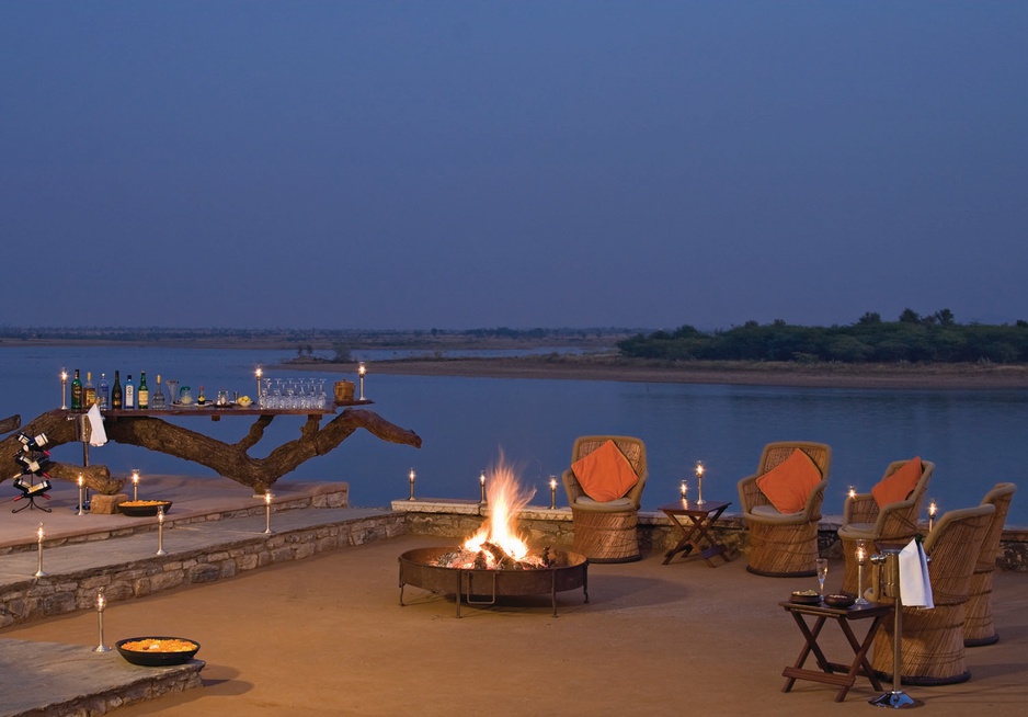 Chhatra Sagar terrace fireplace at night