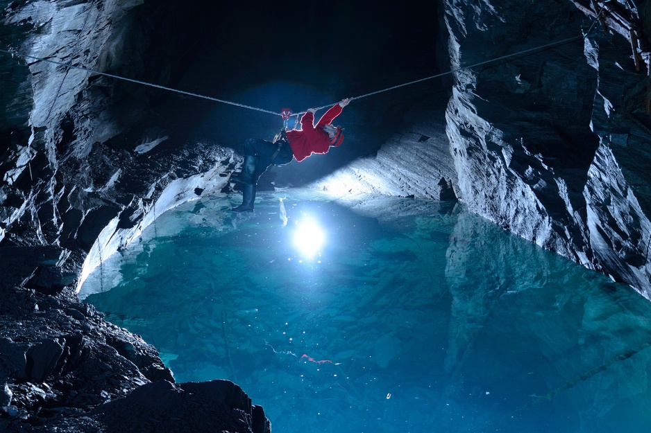 Rope climbing above the underground lake