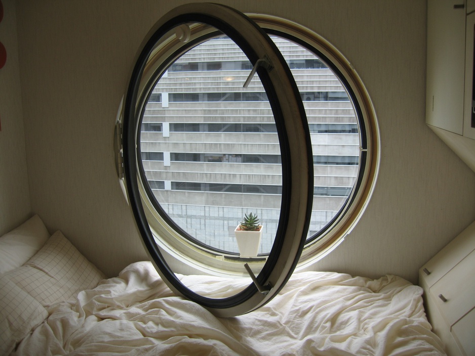 Rounded window at Nakagin Capsule Tower