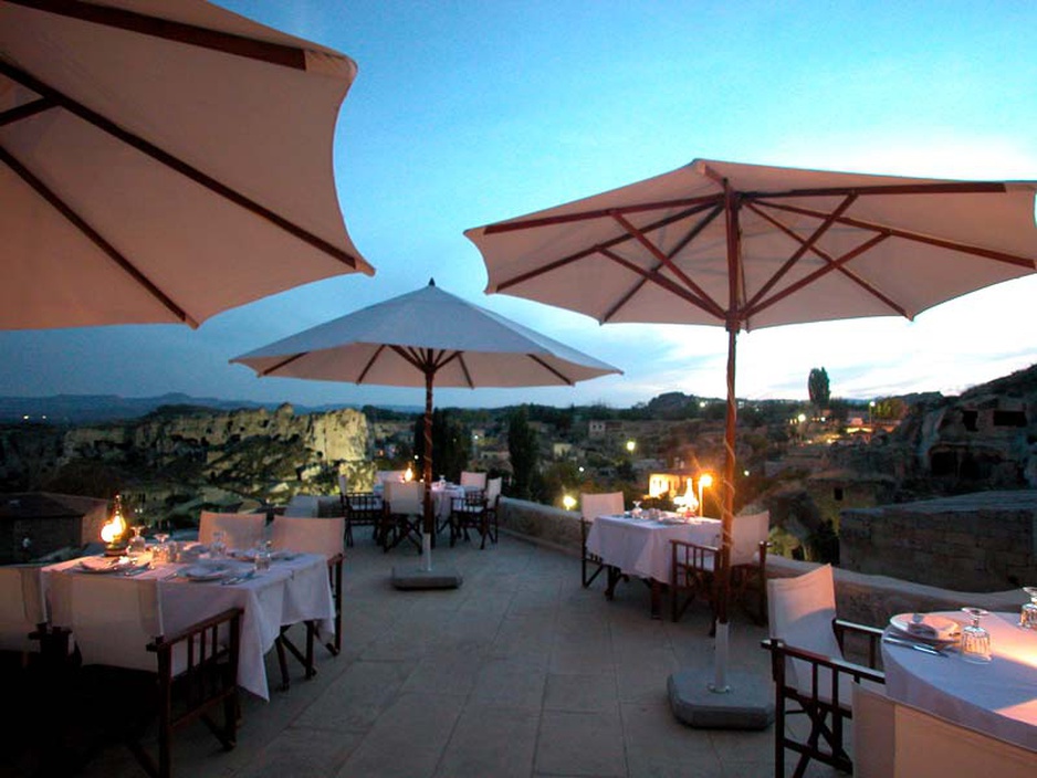 Yunak Evleri rooftop terrace at sunset