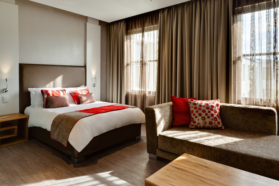 Protea Breakwater Lodge business suite bedroom