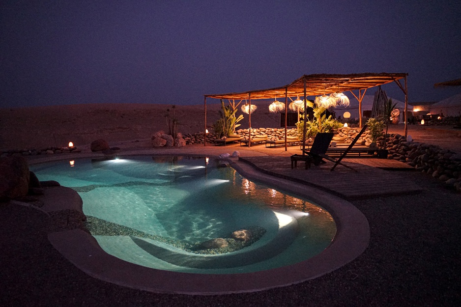 Inara Camp Desert Lagoon Pool at Night