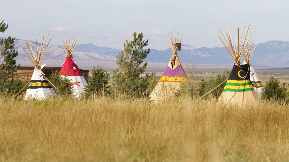 Mustang Monument Resort tipis and mountains