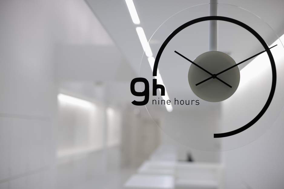 9 Hours Capsule Hotel Clock