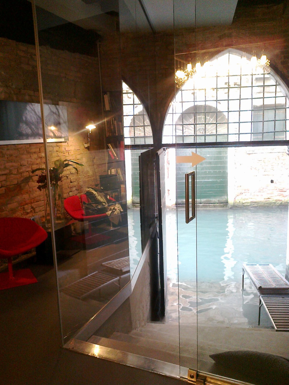 The Charming House entrance from the canal in Venice