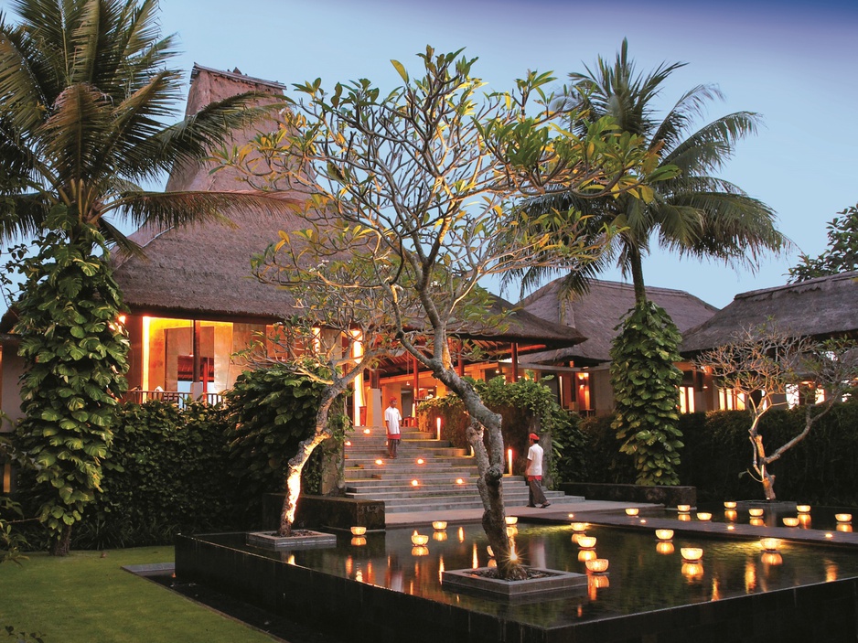 Maya Ubud Resort & Spa lobby exterior in the evening