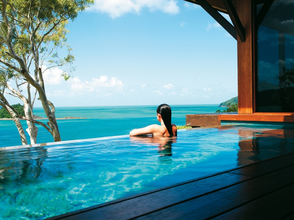 Qualia Hamilton Island girl in the pool