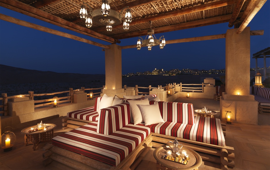 Qasr Al Sarab Desert Resort terrace majlis at night