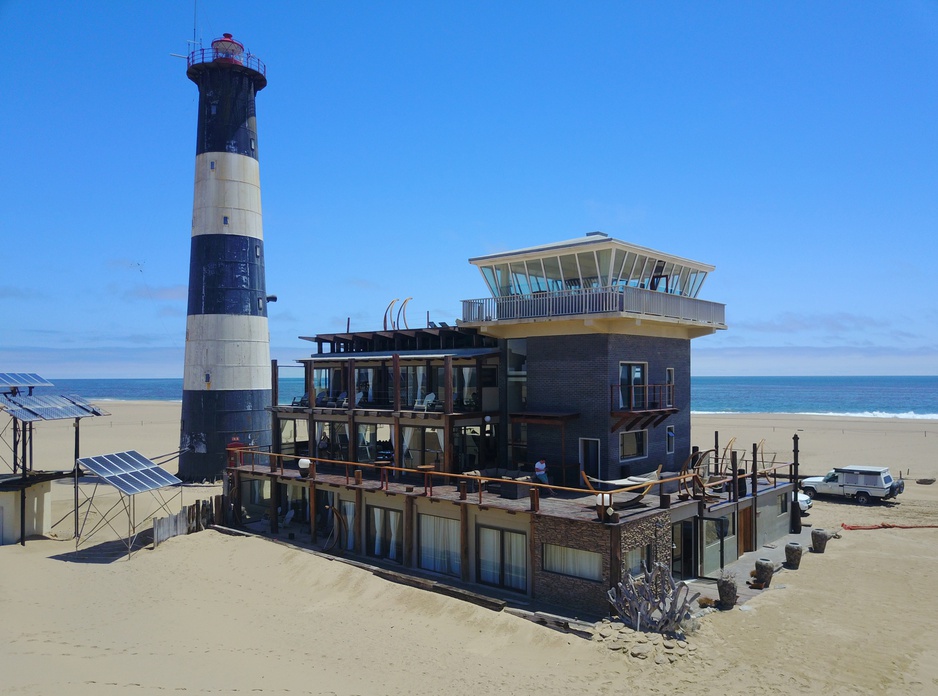 Pelican Point Lodge harbor building and the lighthouse