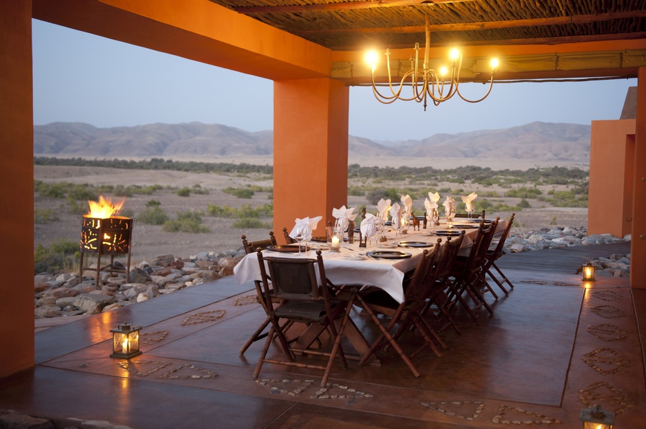 Okahirongo Elephant Lodge dining with sunset view