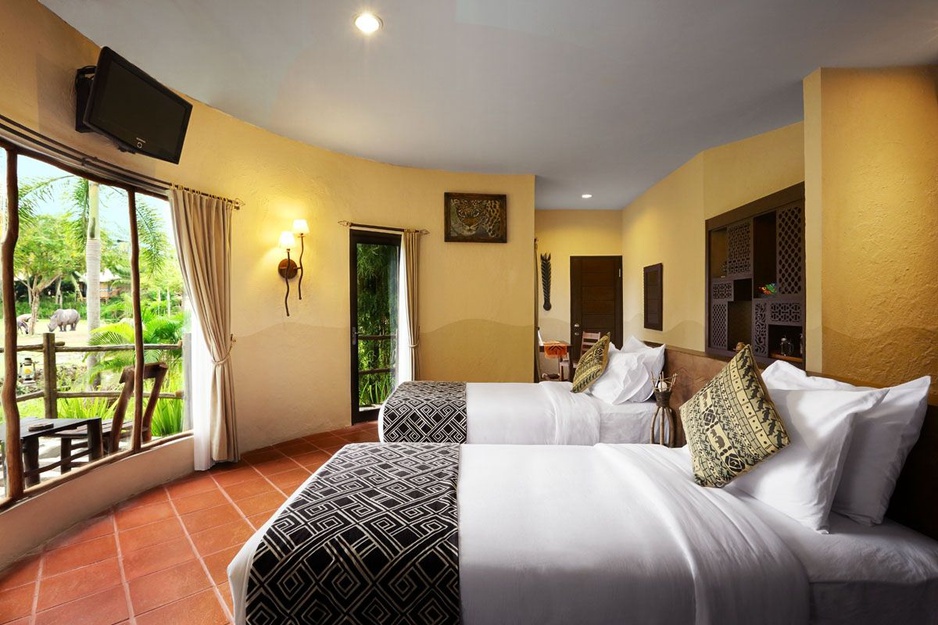 Mara River Safari Lodge bedroom with nature views