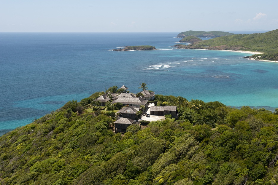 Mustique Island with villas on the top of the hill