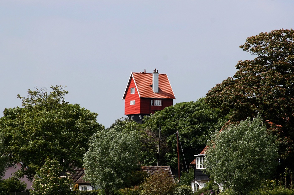 House In The Clouds Above The Trees