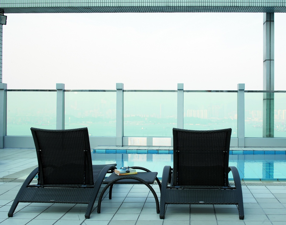 Rooftop pool beds with Hong Kong view