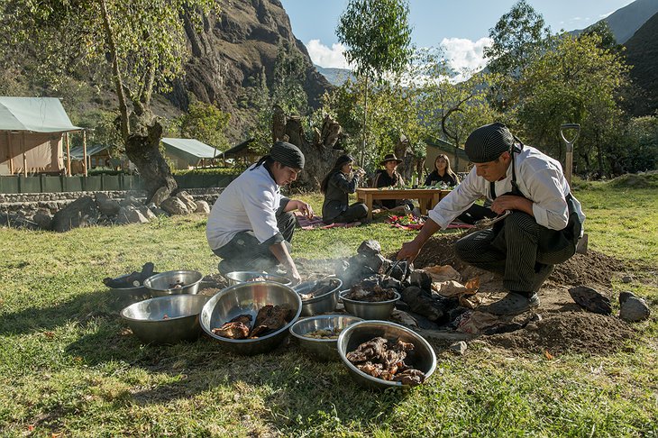 Traditional preparation of the Peruvian dish, Pachamanca