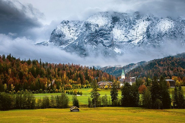 Schloss Elmau in the Valley with the Bavarian Alps in the Background